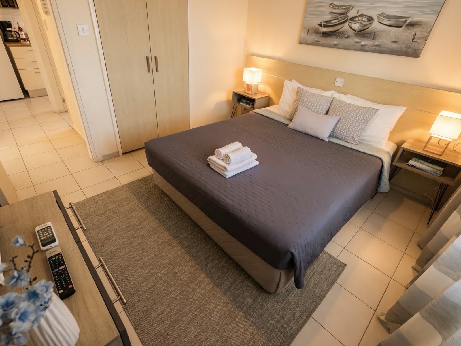 Queen-size bedroom with smart TV